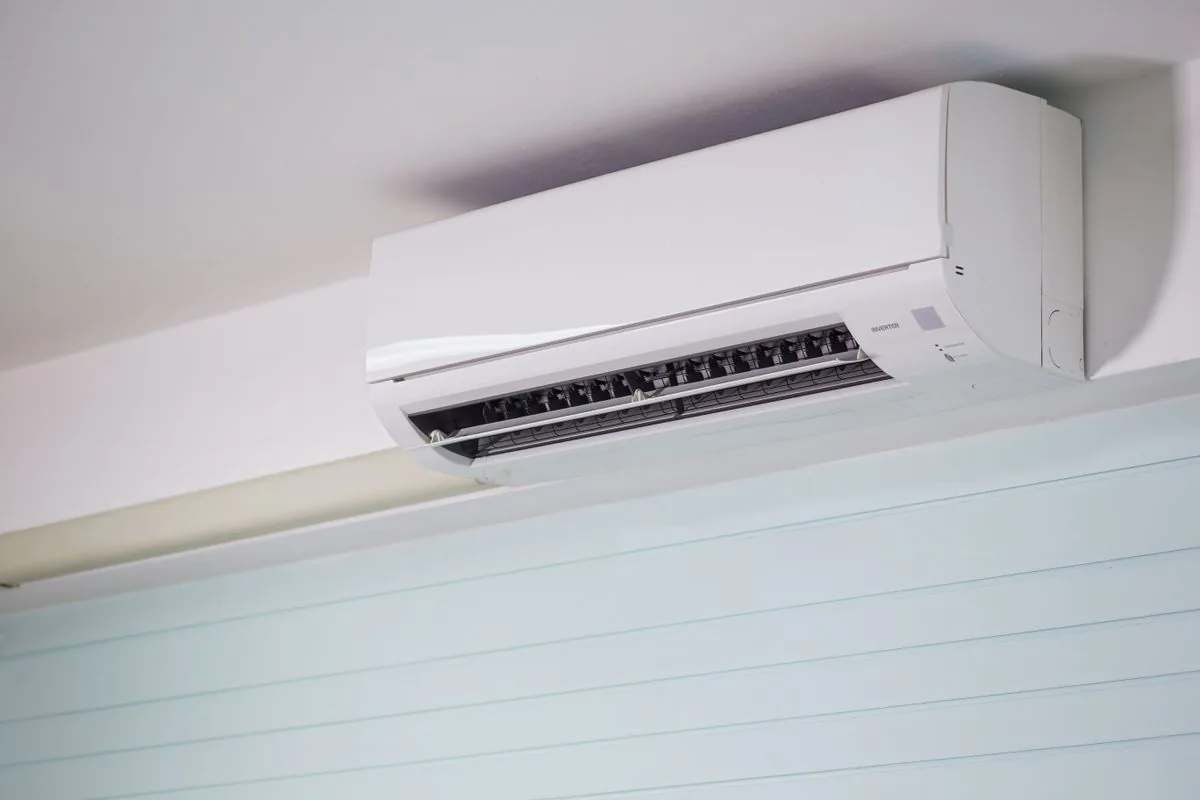 Finished wall-mounted split air conditioner in a bright interior
